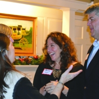Debbie greets Kecia and Joe Burns