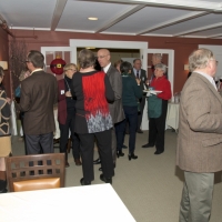 Guests visit in the Sargent Room.