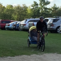 A father pulled his disabled teenage son for the joy of the ride.