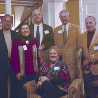 Former Chairs, Heidi Lauridsen, John Garvey, Woody Blunt, Chris Cundey, and Dan Wolf with Debbie Stanley at the 25th Anniversary Holiday Party in 2012.