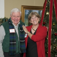 Peggy Hutter enjoys chatting with Steve Ensign at the annual Holiday Party at the New London Inn