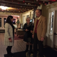Debbie thanks Jeanine and Bill Berger for attending the Holiday Party.