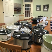 Ausbon Sargent always provided a chili dinner at the end of the ride.  Here, the many crockpots illustrate the quantity needed to satisfy the many riders.
