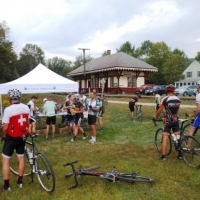 Cyclists enjoy lunch at the railroad depot in Potter Place