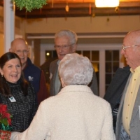 Debbie Stanley welcomes guests to our Annual Holiday Party at the New London Inn